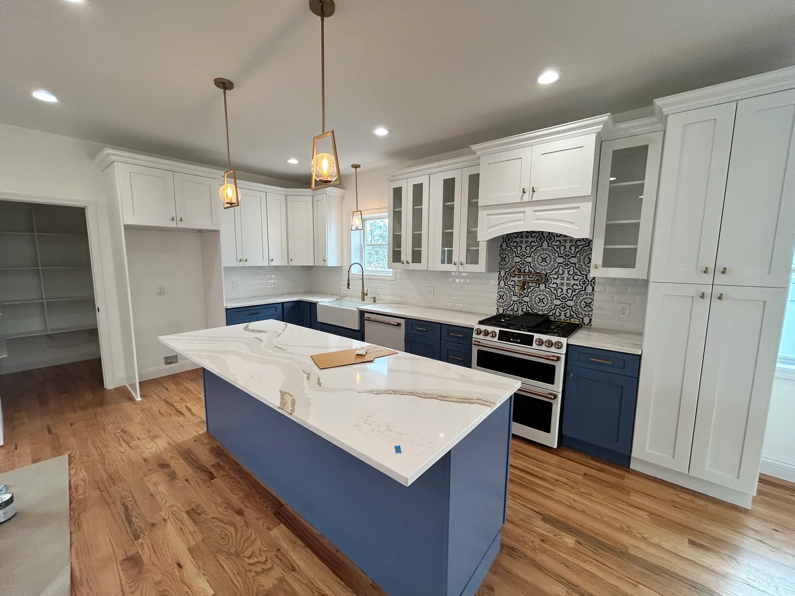 Ice White Shaker with XTerra Blue Shaker — a kitchen supplied by Wow Cabinets